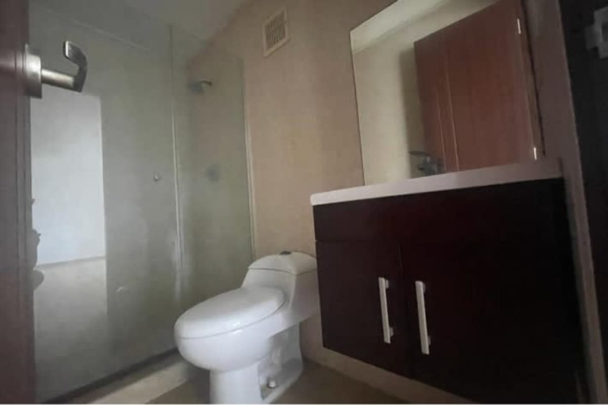 Contemporary bathroom with glass shower and vanity PH Condado View Panama