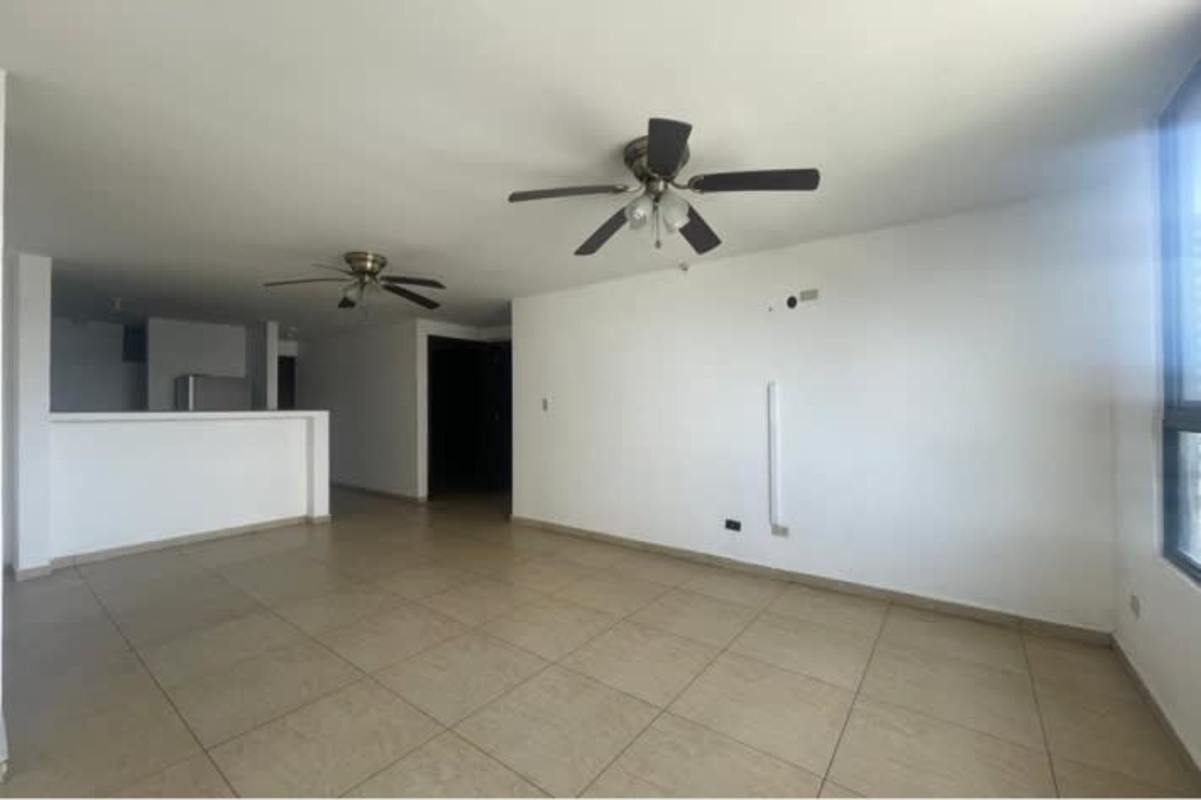 Modern kitchen with granite counters, stove, wood cabinets PH Condado View