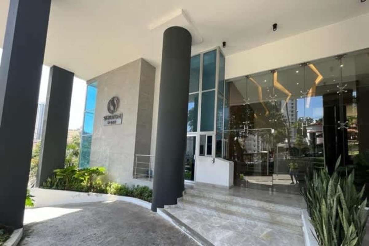 Bright interior commercial unit with full glass doors looking onto busy street in Bella Vista Panama