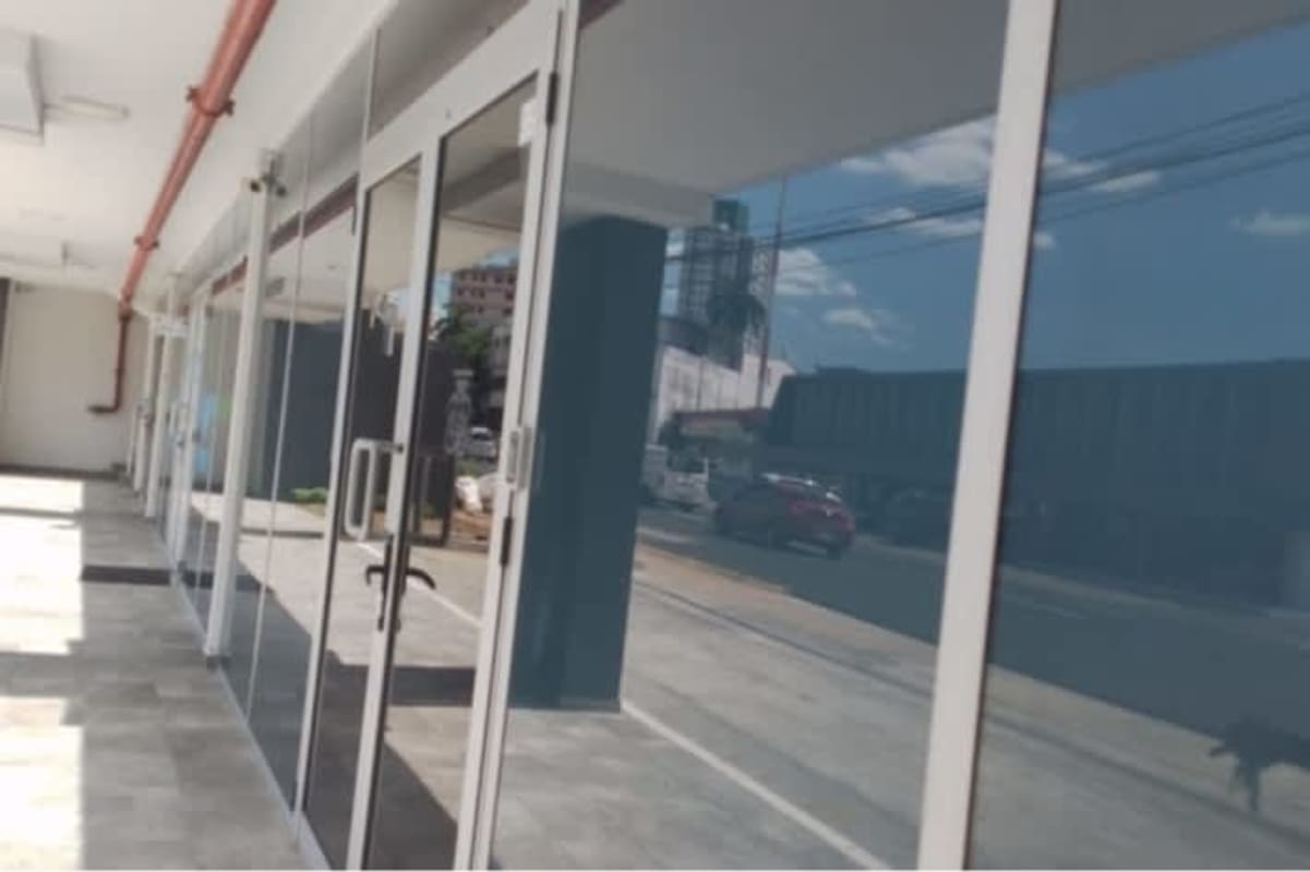 Glass door entrance exterior view commercial rental unit Bella Vista Signature Point Panama