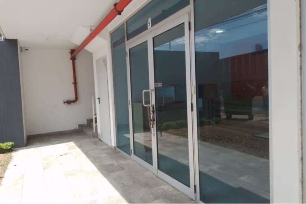 Open interior with tiled floor and glass doors overlooking Avenida Samuel Lewis Bella Vista Panama