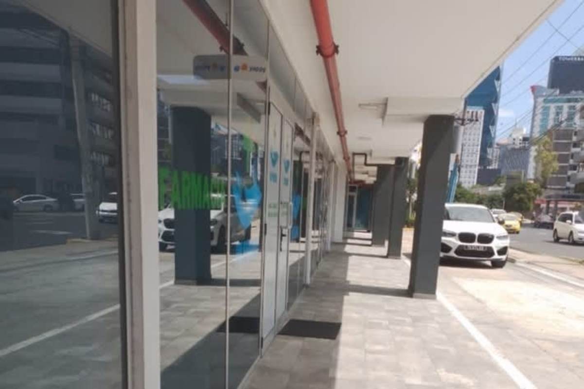 Corner retail unit with glass facade and street parking in Bella Vista Panama
