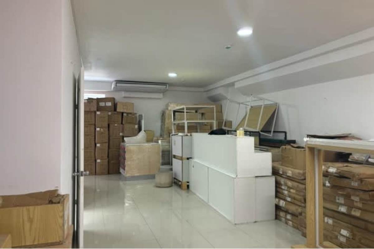 Storage room with air conditioning and shelves inside commercial unit in Bella Vista Panama
