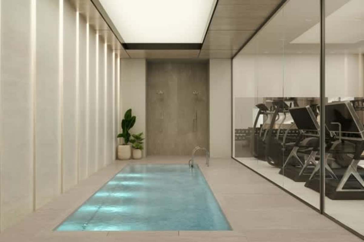 Rooftop infinity pool overlooking ocean and city skyline at PH Moderna Marbella Panama