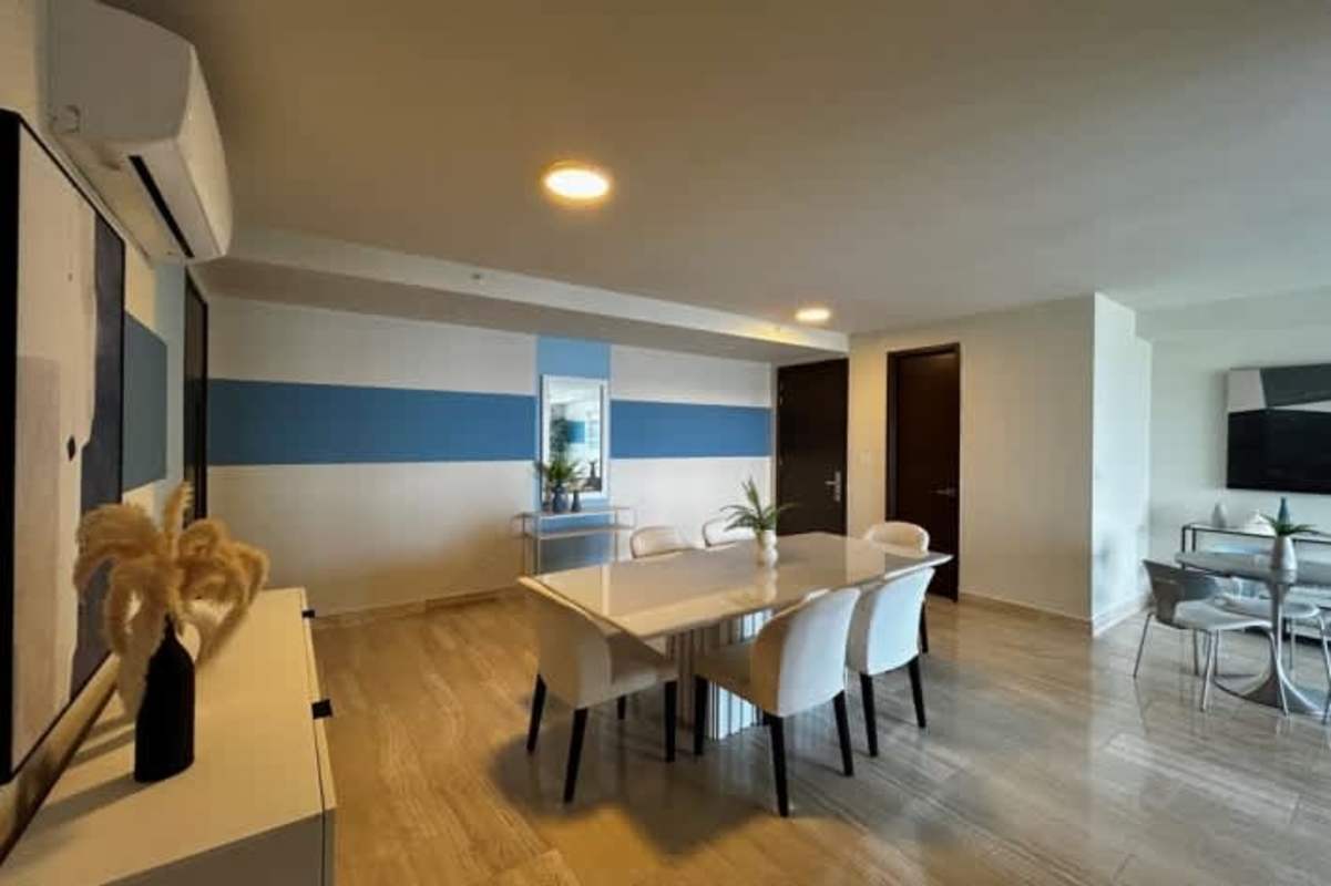 Elegant bathroom with glass enclosed shower, modern fixtures in luxury Empire apartment Panama