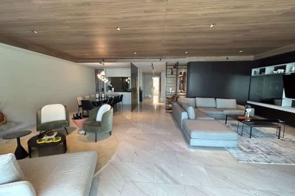 Modern bathroom with marble counters and glass shower PH Punta Paitilla Panama