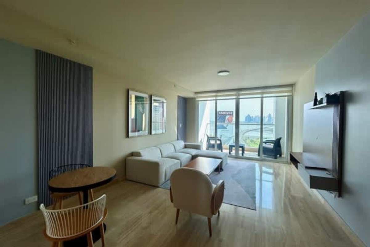 Master bedroom with large window and ocean views in luxury rental Costa del Este Panama