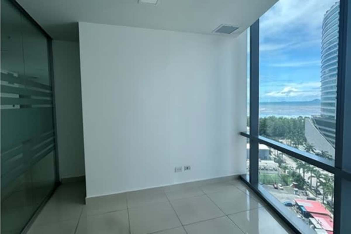 Open office space with floor-to-ceiling windows panoramic views PH Financial Park Panama