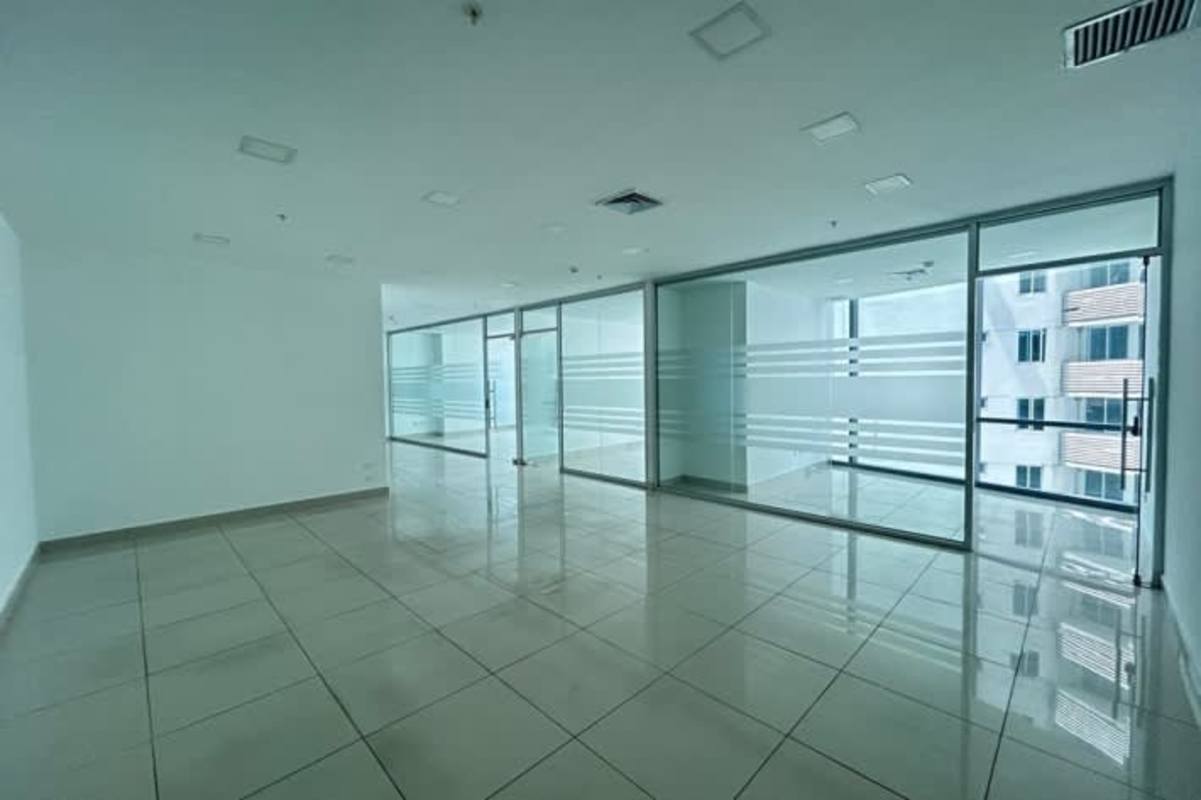 Workspace with floor-to-ceiling windows and glass offices PH Financial Park Panama