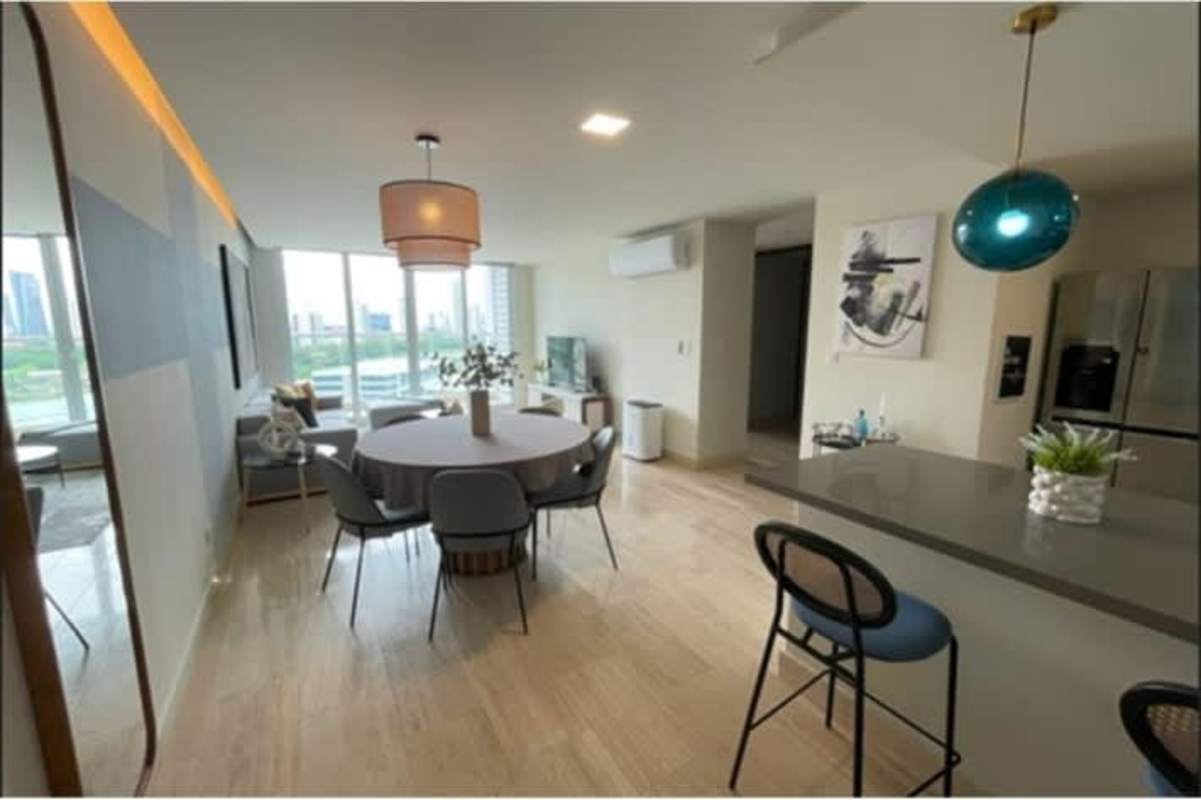 Open concept living dining floor-to-ceiling windows city views PH Costa del Este Panama