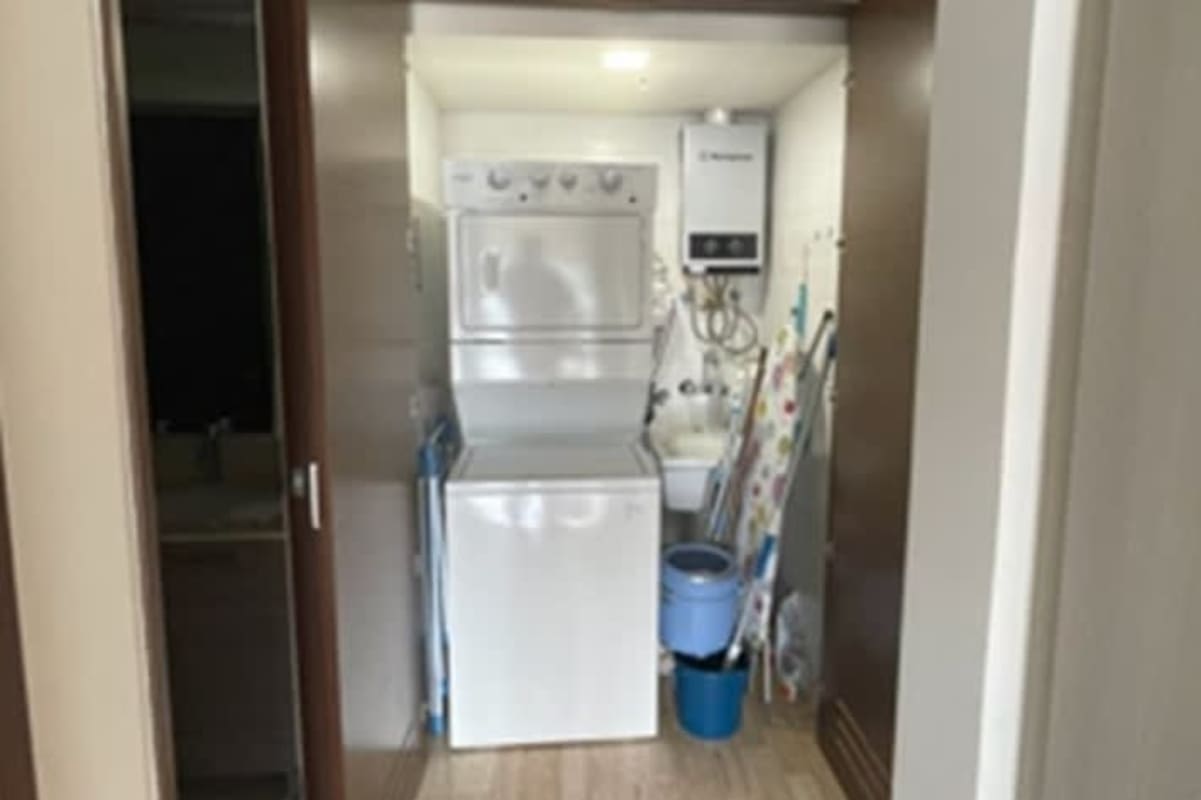 Modern bedroom with accent wall, padded headboard, built-in wardrobe PH Costa del Este Panama