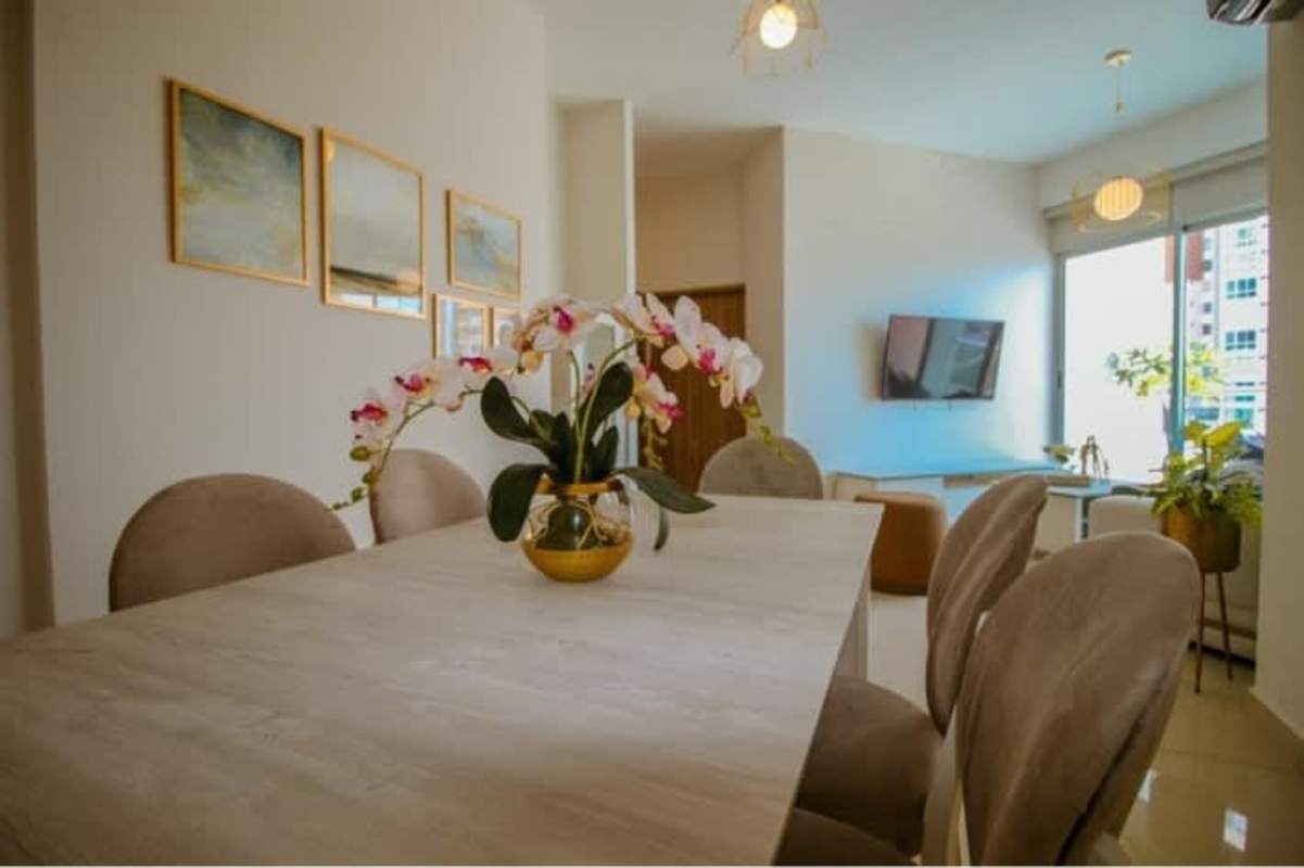 Modern bathroom with glass shower enclosure and vanity in PH Bella Veduta Panama