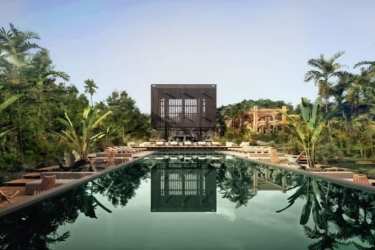 Modern black cube luxury eco villa with pool lush setting Playa Venao Panama