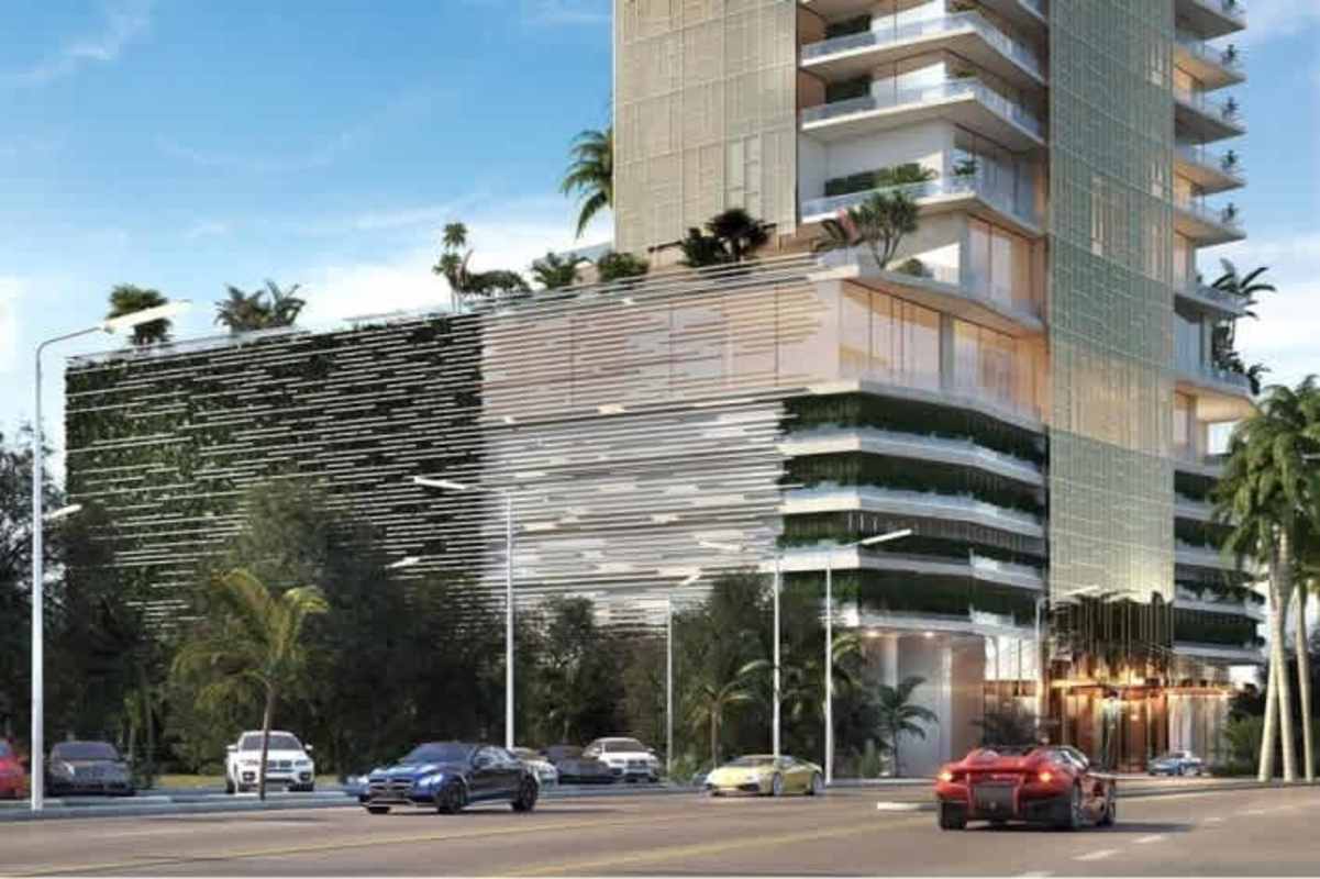 Modern luxury tower at PH La Maison with balconies and green facade in Santa María Panama City
