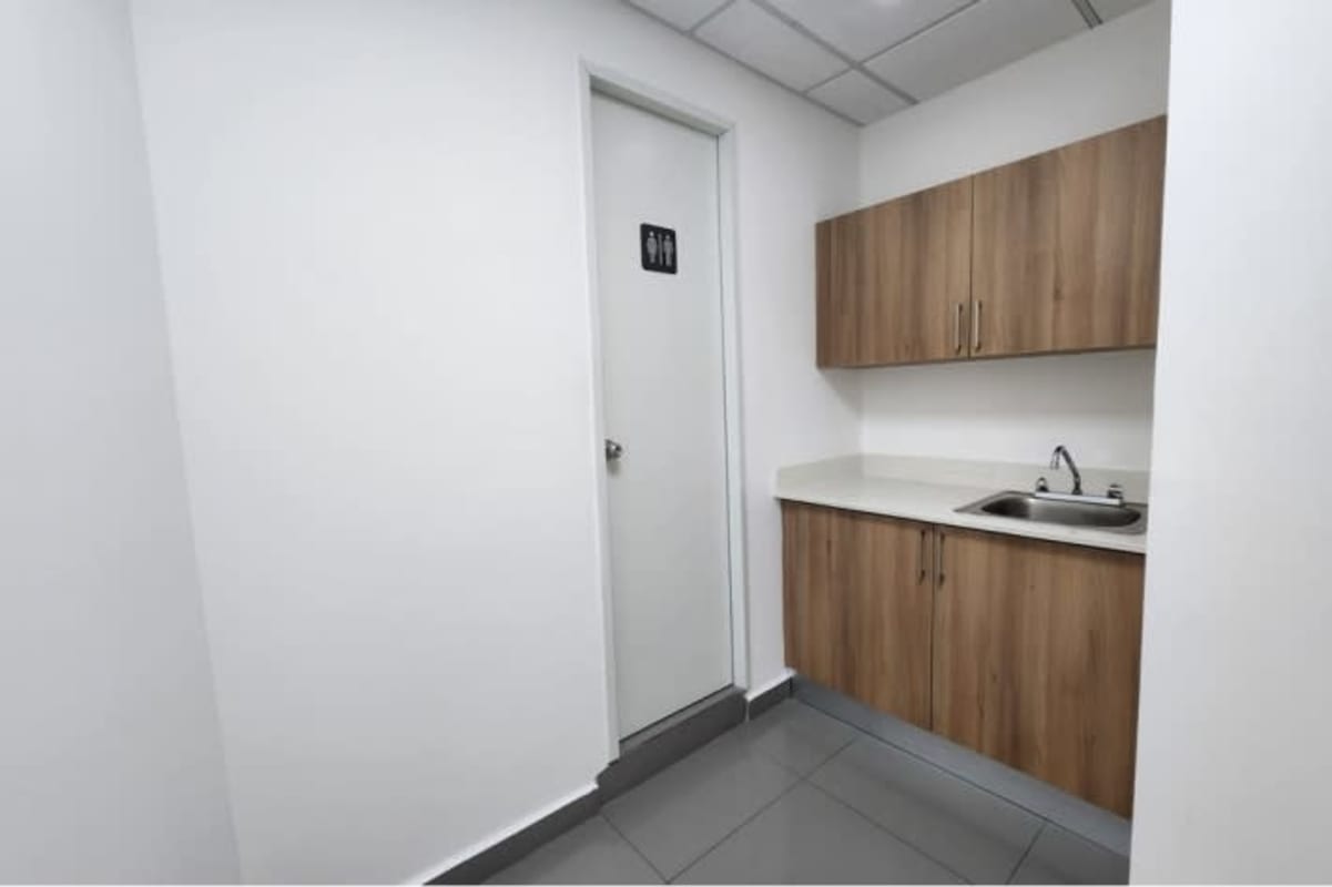 Modern curved glass facade office building in Costa del Este Panama City