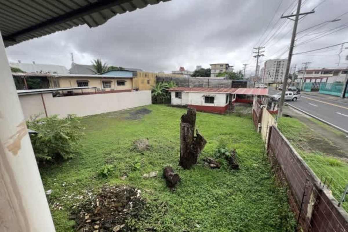 Vacant yard space with fencing and recreation area in institutional building Panama City