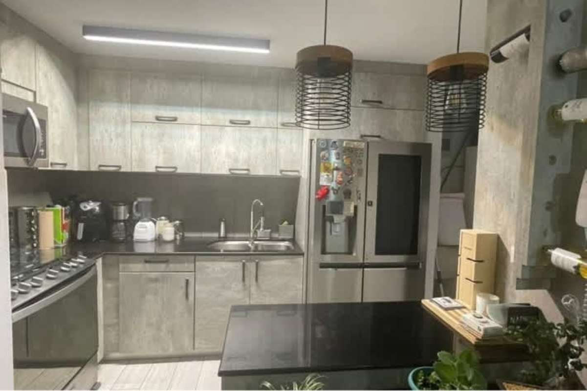 Laundry area with washer/dryer hookup and storage at PH Splendor By The Park Carrasquilla Panama City