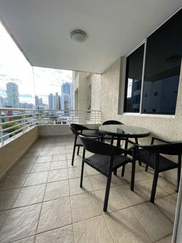 Modern balcony with outdoor dining set and city skyline view in PH Obarrio Panama