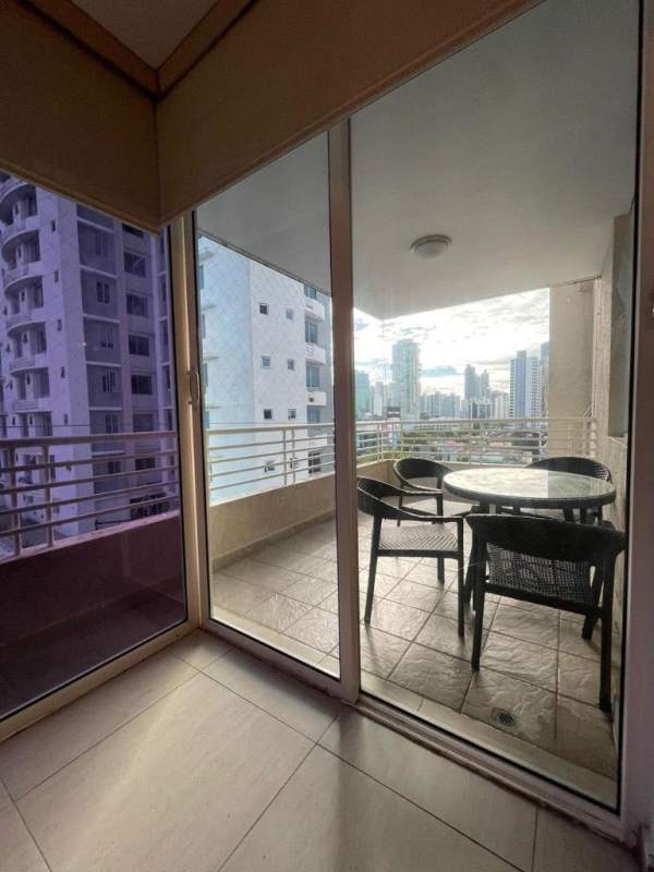 Balcony with panoramic skyline view outdoor seating PH Obarrio apartment Panama