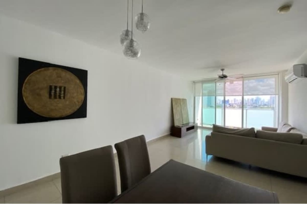 Fully furnished dining and kitchen area with granite countertops in PH Marina Plaza