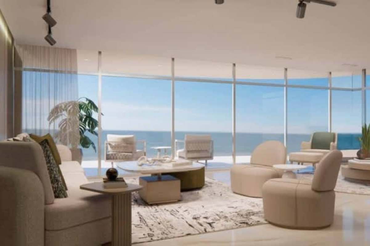 Spacious living room with floor-to-ceiling windows showcasing ocean view Allure Punta Pacifica Panama