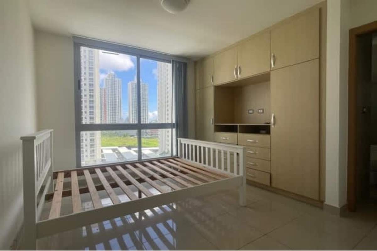 Minimalist bedroom with large wardrobe and city views Panama