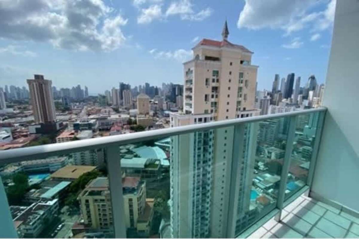Private balcony with glass railing offering skyline views in PH El Cangrejo Bella Vista Panama City