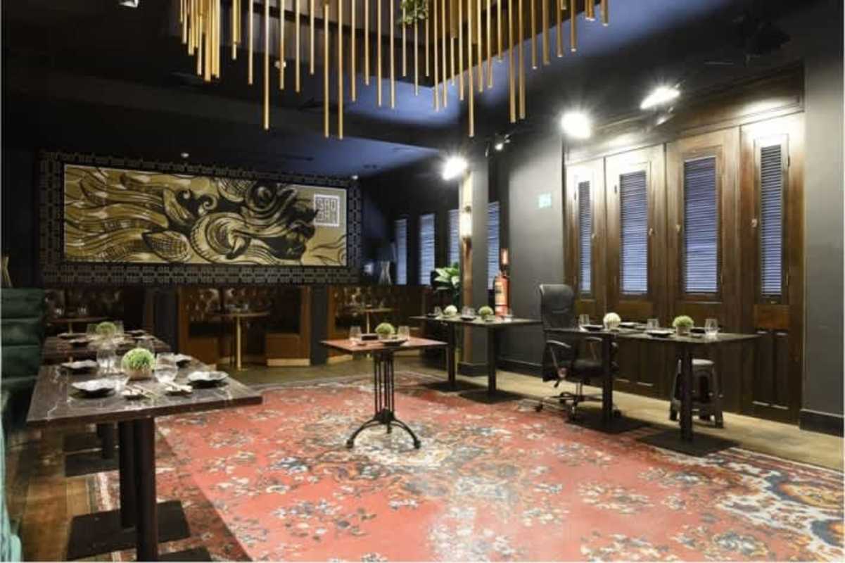 Modern commercial space with illuminated bar plush seating in Casa Feraud Casco Viejo Panama for lease