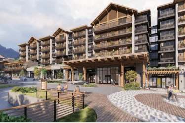 Multi-story alpine inspired condos balconies wood stone accents Boquete Town Center