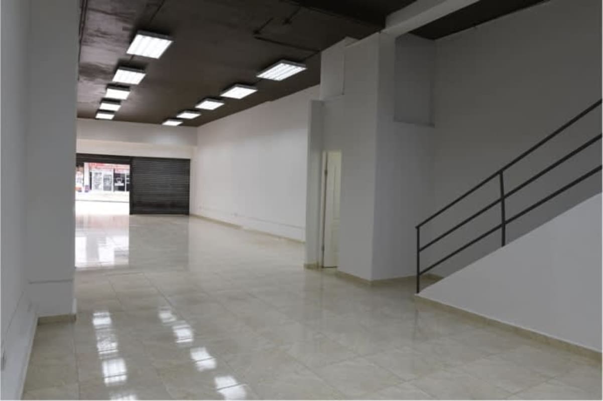 Spacious empty shop area tiled with fluorescent lighting historic Don Goyo Building Panama City