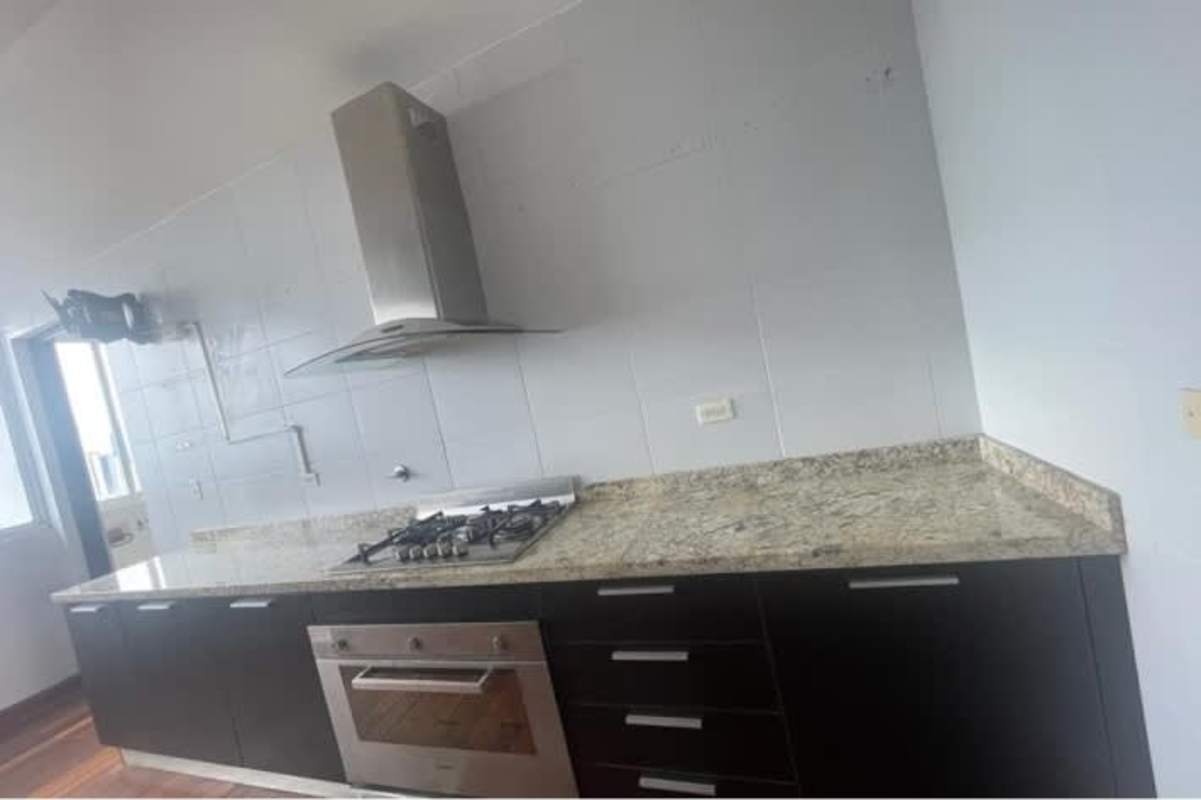 Spacious living room with skyline views large windows penthouse PH El Cangrejo Panama