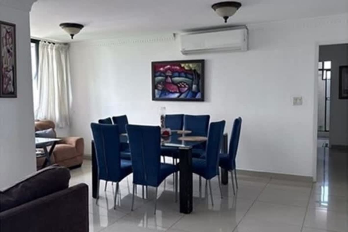 Bedroom with built-in closet, split AC and tiled floor at PH Punta Paitilla Panama City