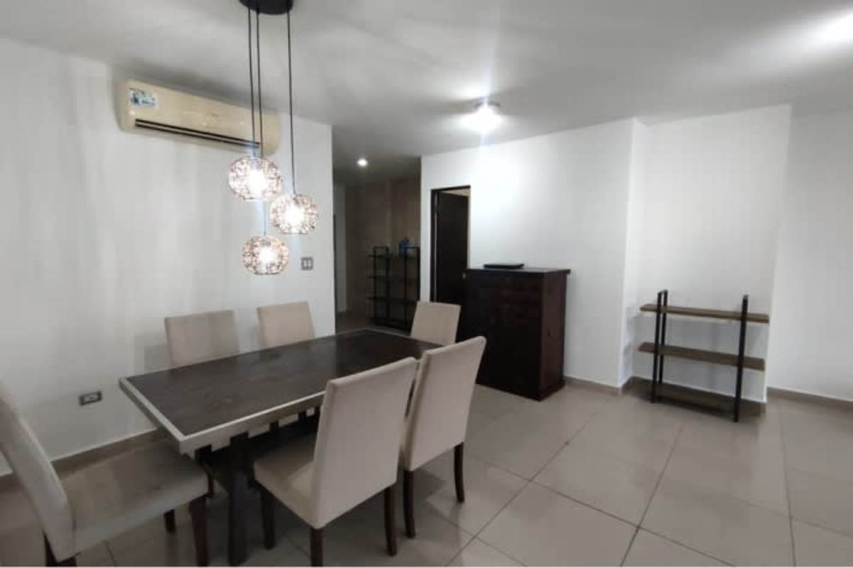 Dining room with table and lighting furnished apartment PH Coco del Mar Tower