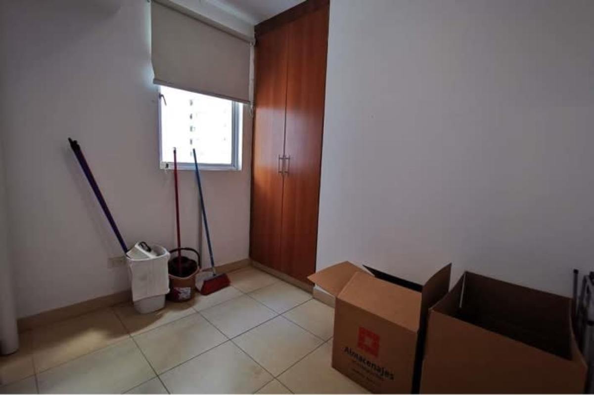 Main bedroom with ensuite bathroom, closet and large window PH Blue Park loft in Panama City