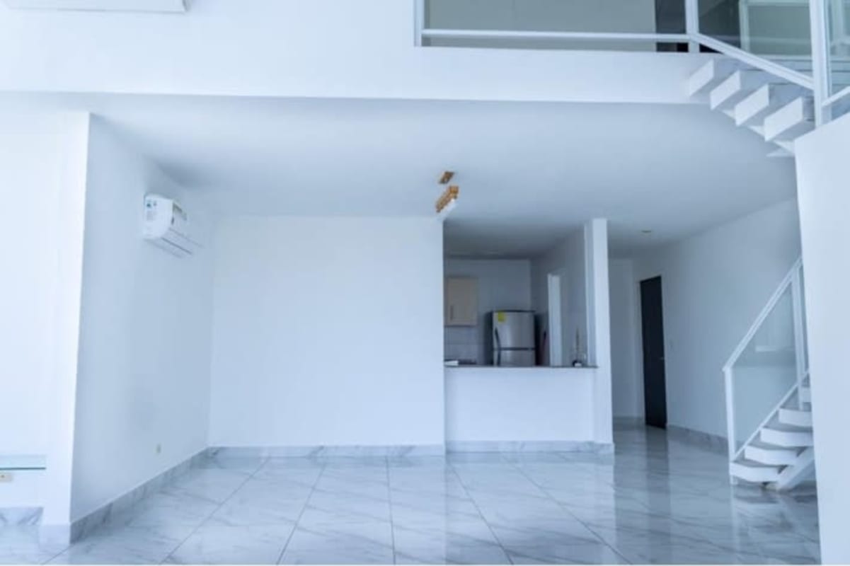 Spacious modern lobby with large windows and seating at PH Blue Park Bella Vista Panama