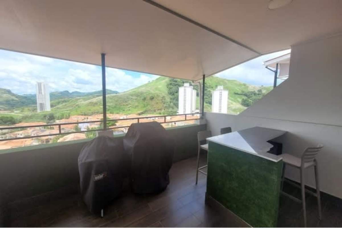 Minimalist white kitchen with stainless steel fridge and gas stove Limajo San Miguelito home