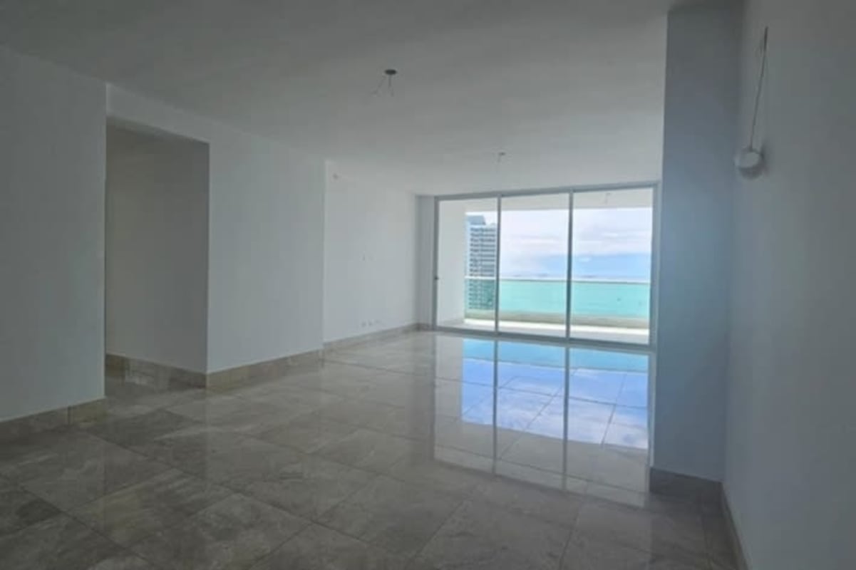 Empty bedroom large panoramic window ocean view high floor Panama City Bella Vista