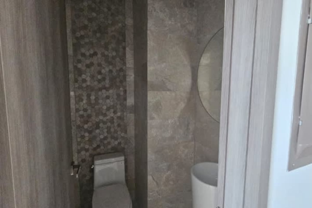 Modern bathroom marble walls luxury finishes condo Panama Bella Vista