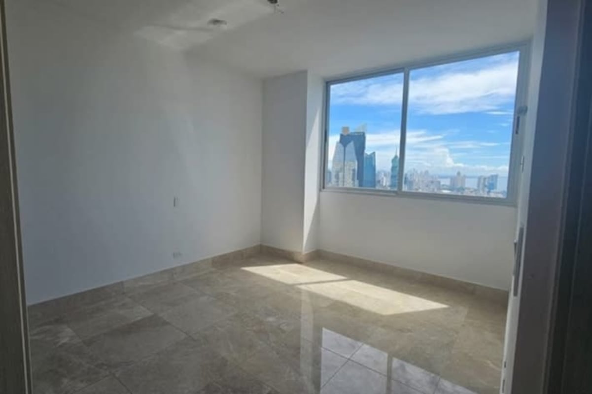 Empty bedroom large window skyline city view Panama City Bella Vista condo