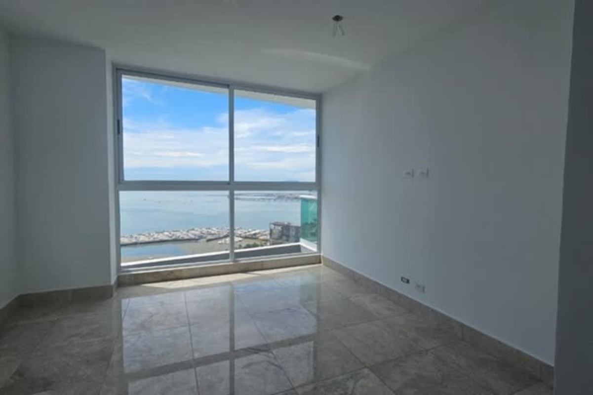 Modern kitchen white cabinets granite countertops city view Bella Vista Panama