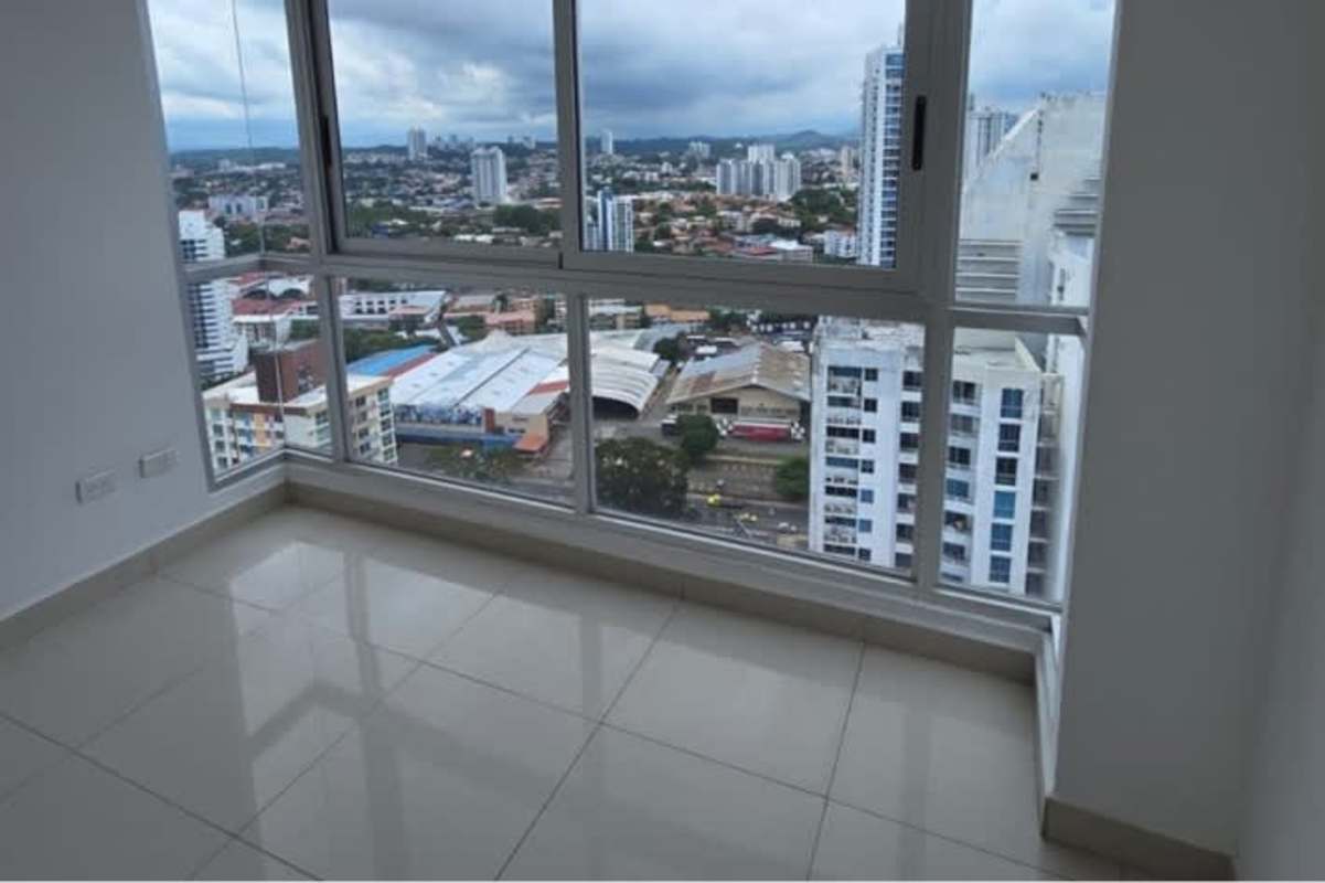 Corner apartment space with floor-to-ceiling windows and skyline views PH Park Point