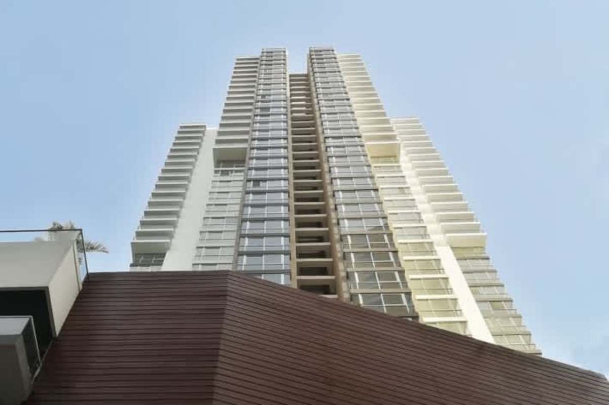 Modern high-rise apartment tower with glass balconies PH Park Point Panama City