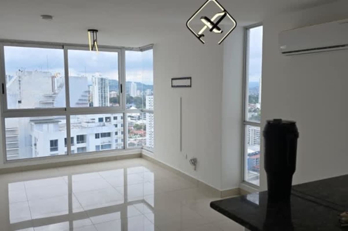 Living space with floor-to-ceiling windows and city view PH Park Point