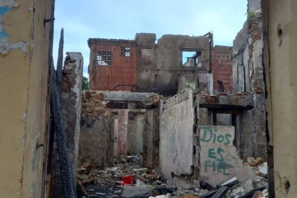 Crumbling historic facade with balcony and exposed brick Casco Viejo Panama