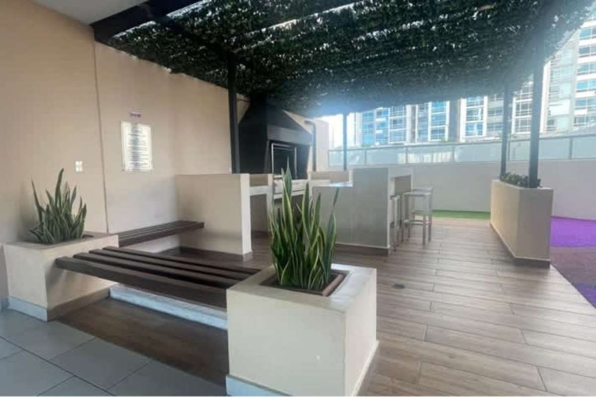 Covered terrace with barbecue grill and seating PH Park View Carrasquilla Panama City