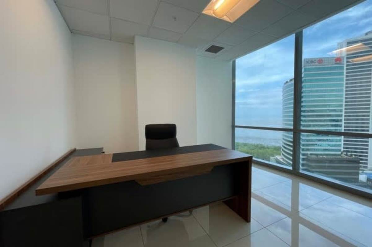 Executive-style office suite with tall windows panoramic Panama city views in Costa del Este