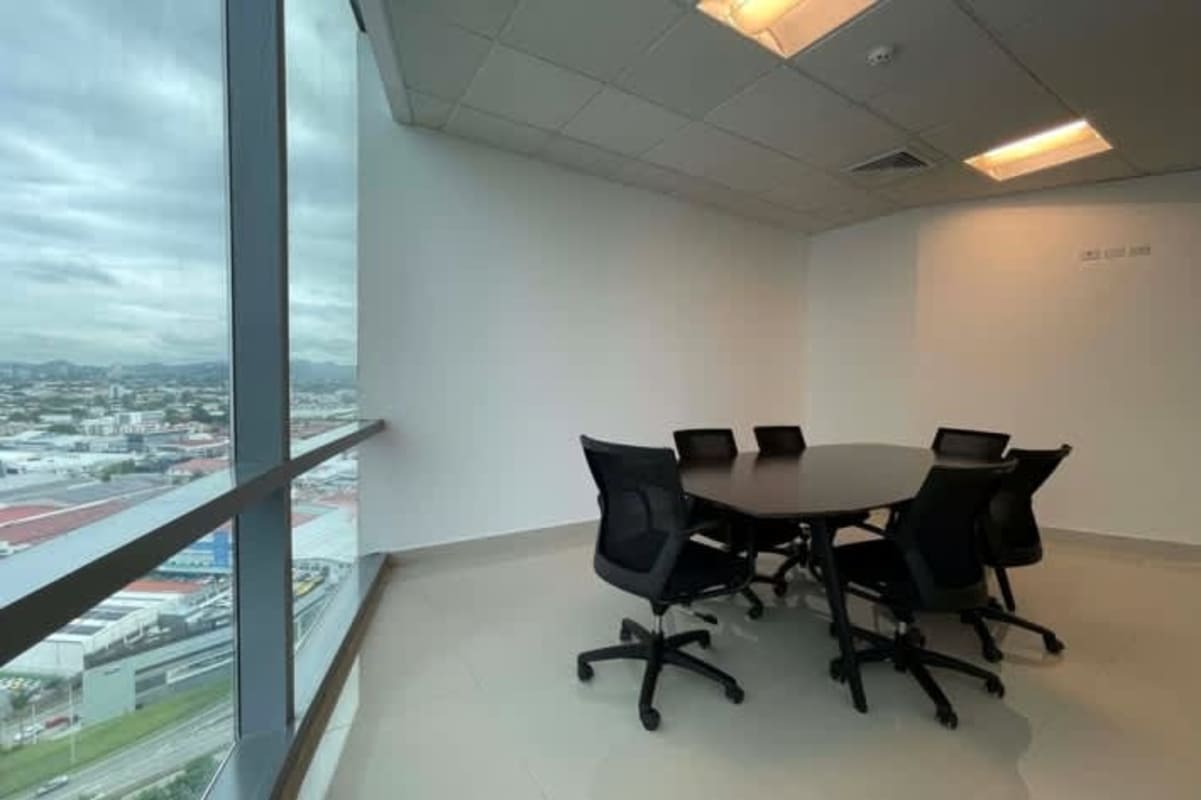 Private executive office with floor-to-ceiling glass walls and skyline view in Costa del Este Panama