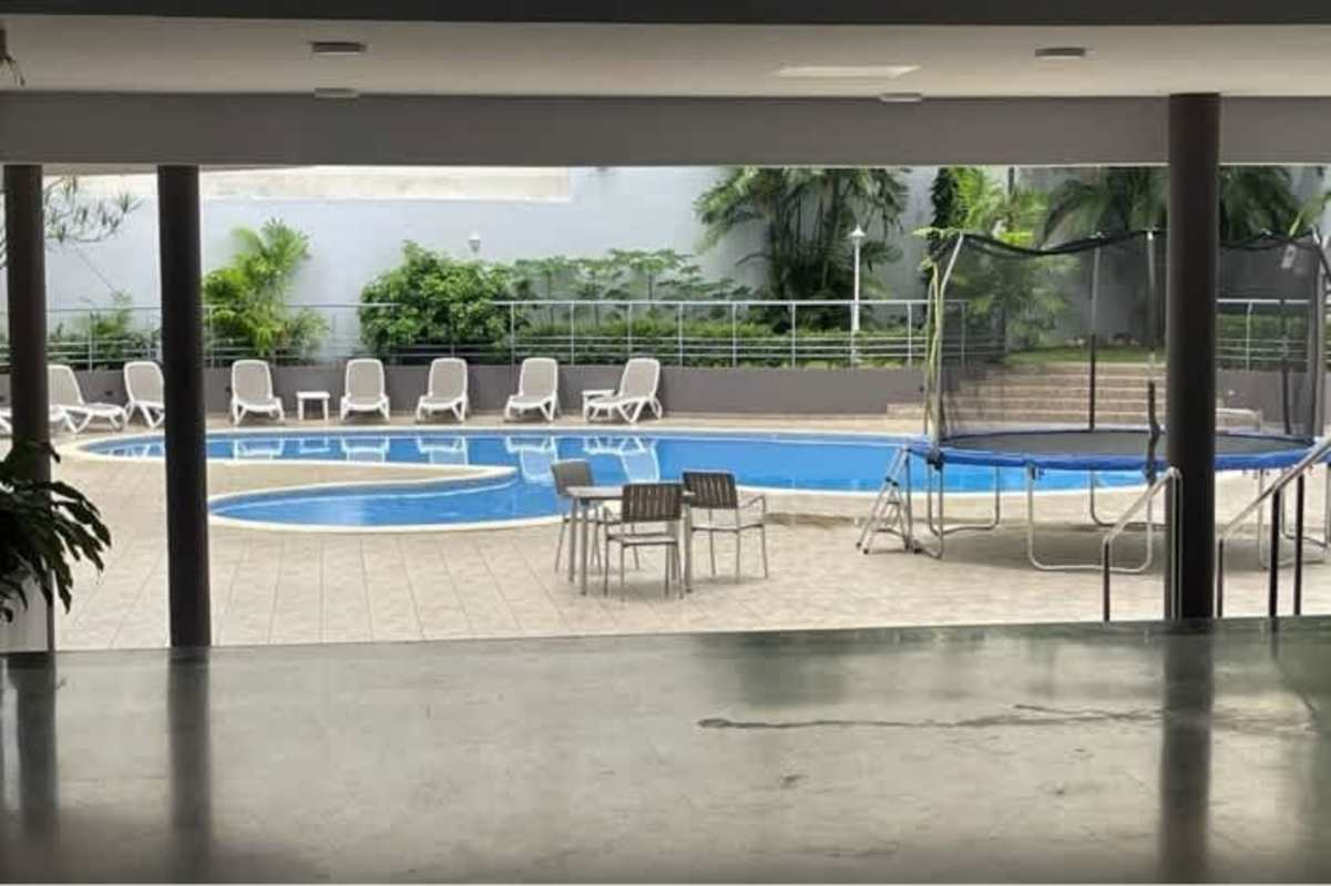 Marble floor living room with large windows city skyline view PH The Point
