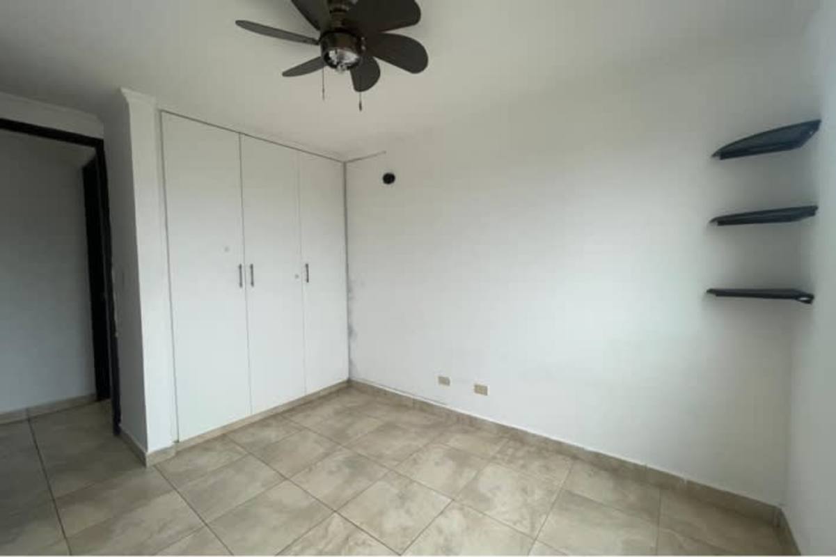 Bright bedroom with two windows and corner storage PH Parque Lefevre Panama