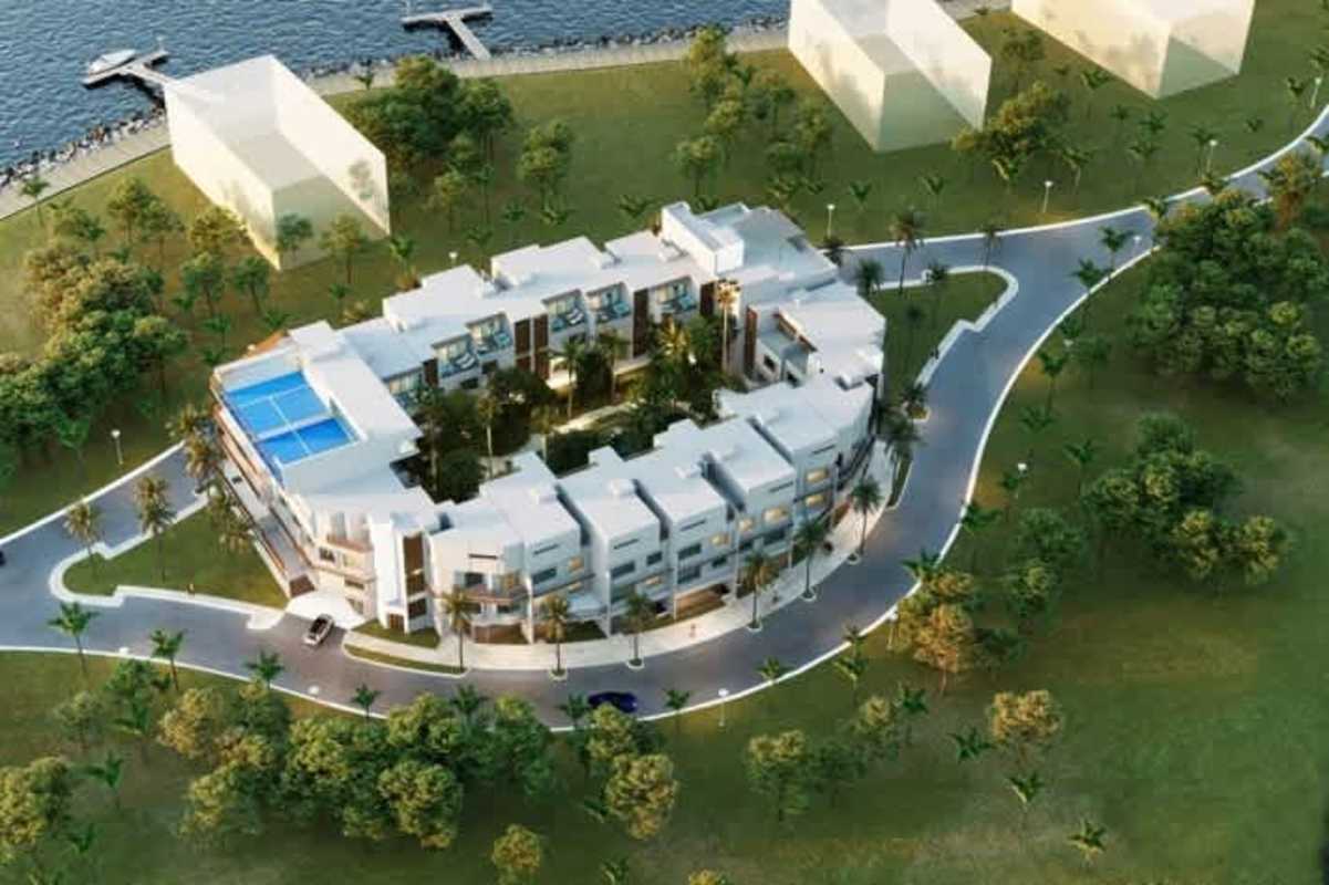 Luxury waterfront apartment complex central garden and marina at Ocean Reef Panama City